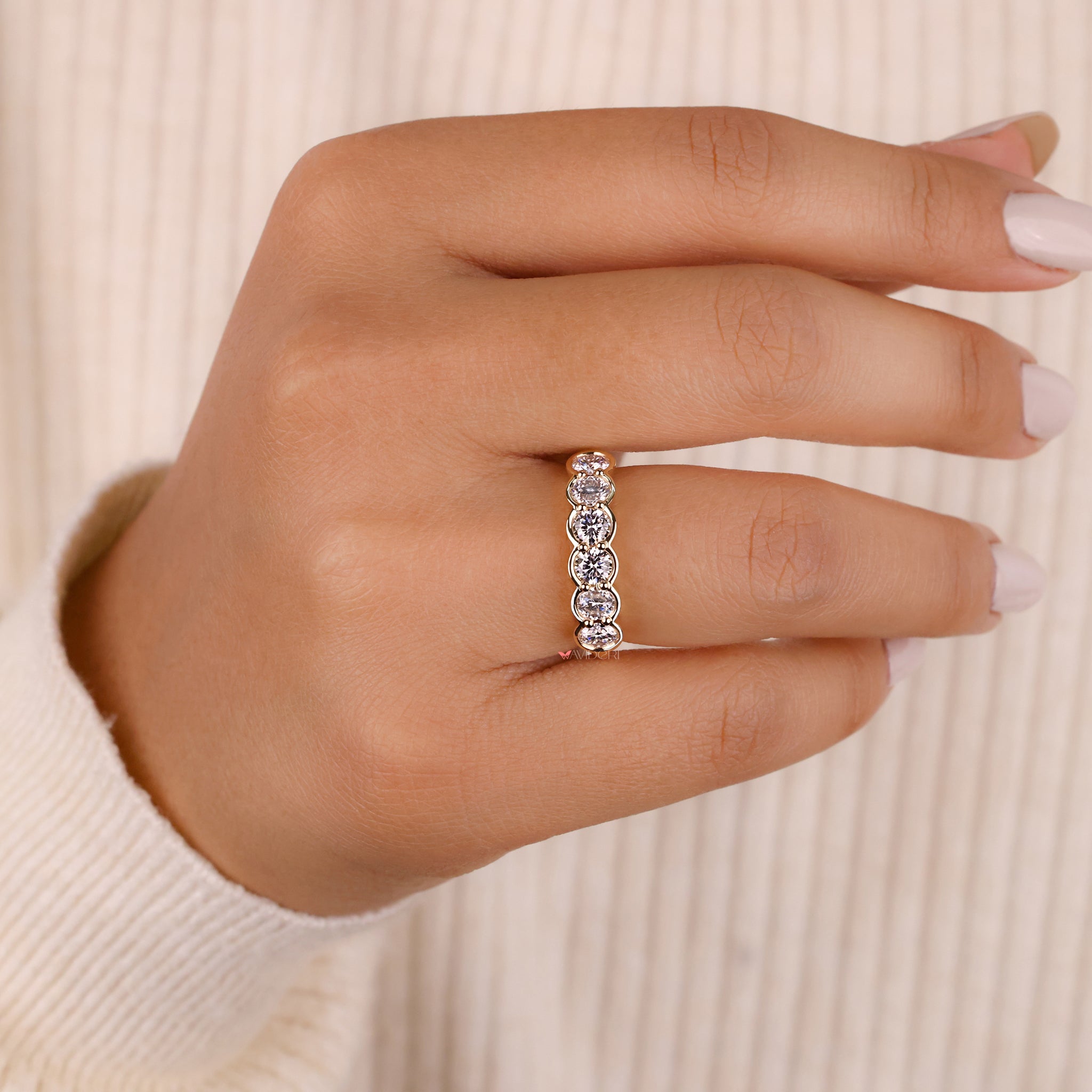 Elegant Avideri wedding band with lab diamonds.
