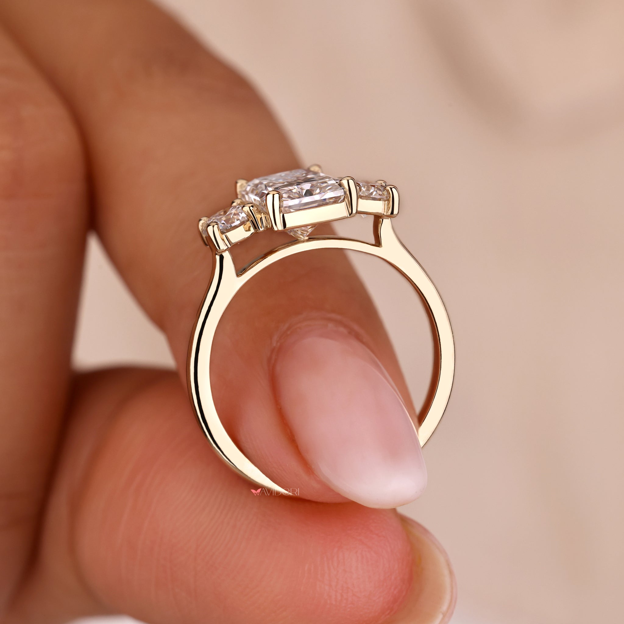 Yellow gold engagement ring with radiant cut diamond

