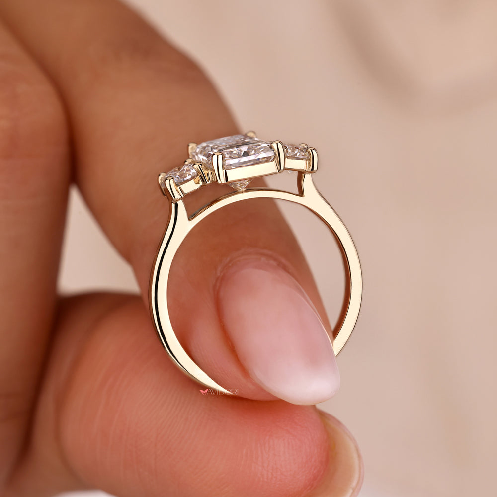 Yellow gold engagement ring with radiant cut diamond
