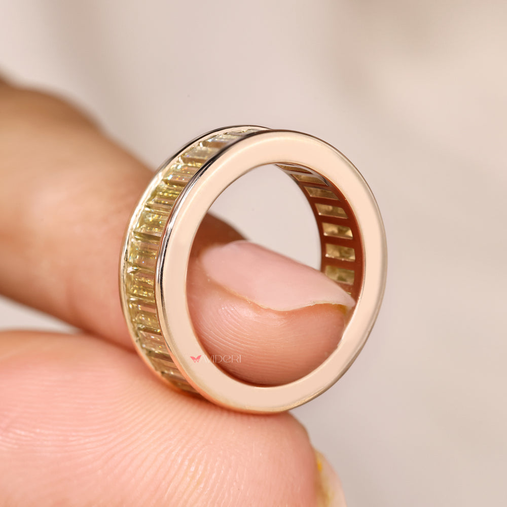 Eternity band with channel set baguette stones.
