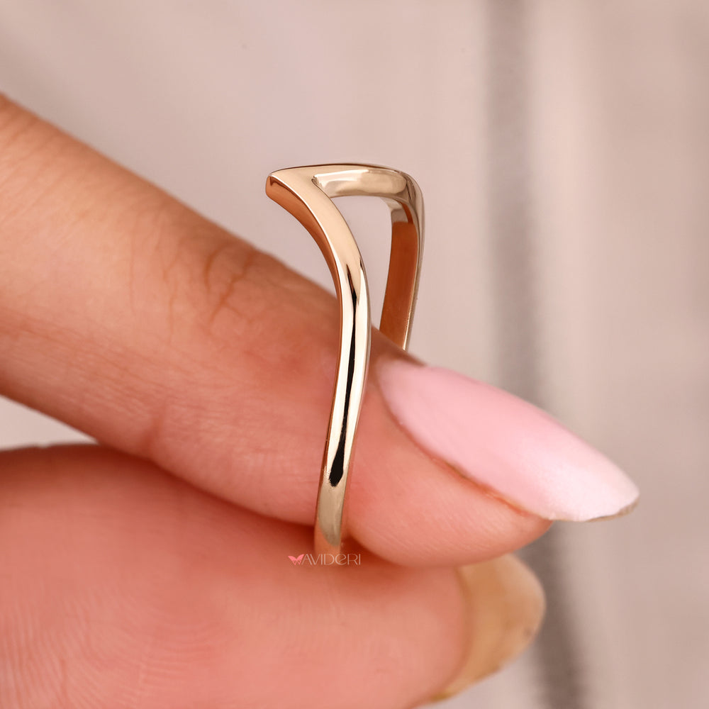 Minimal chevron wedding band in v shape.