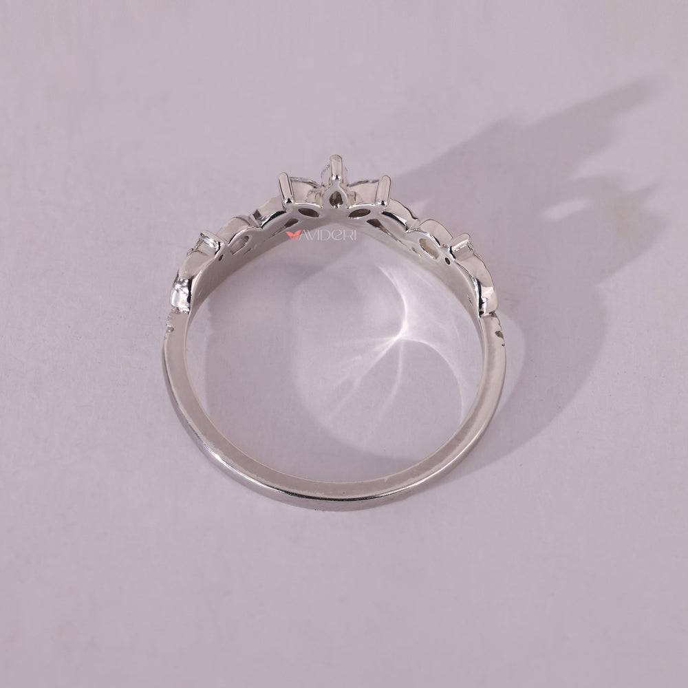 White gold wedding band with round diamonds, designed for a classic and enduring look.