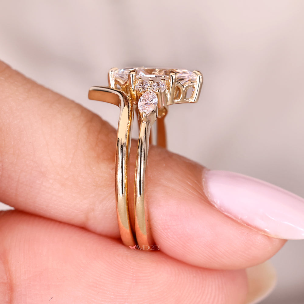 Marquise ring with muse setting and tapered shank.
