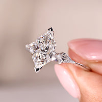 Dutch Marquise Ring With Kite Cut Side Stone