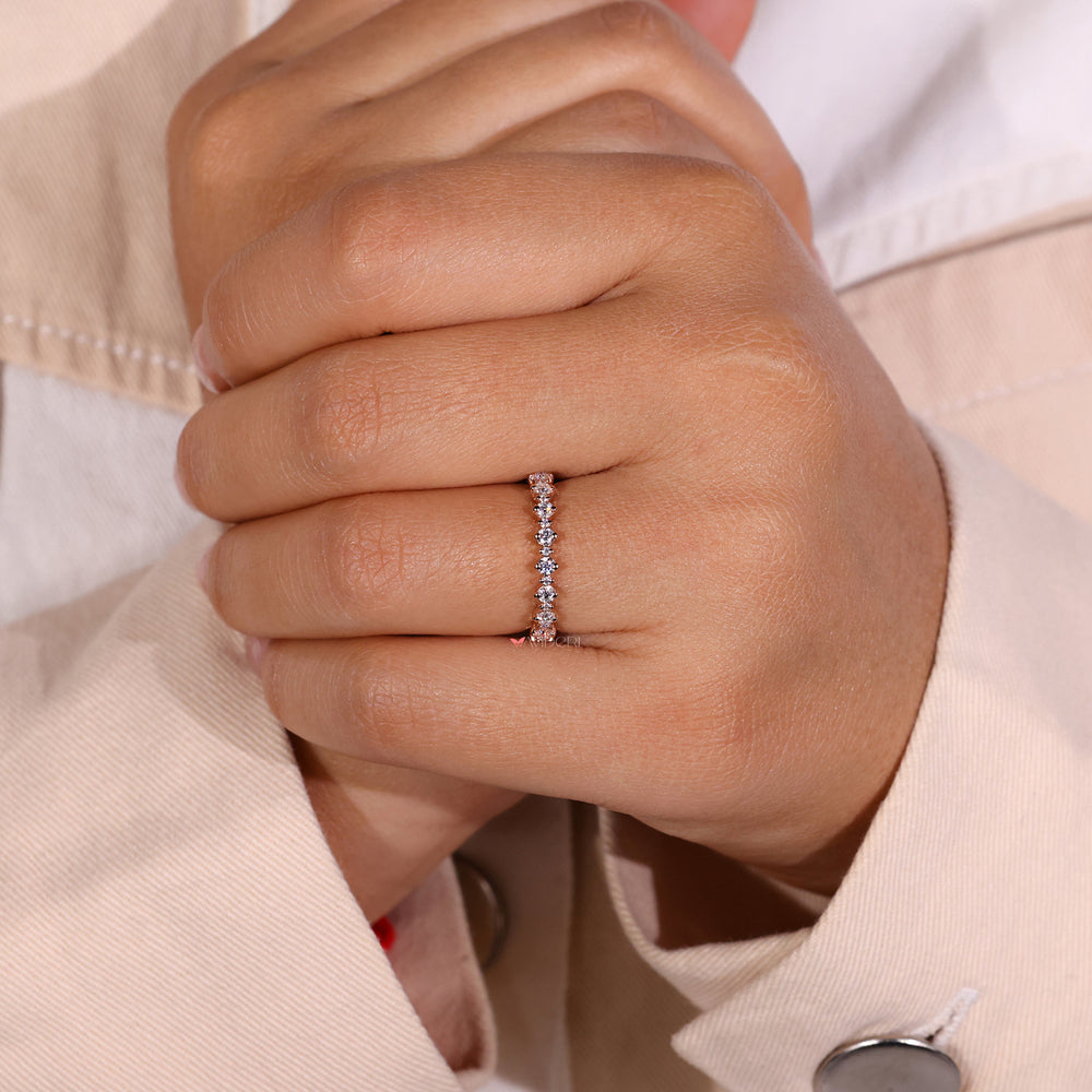 Half eternity wedding band in sleek rose gold.
