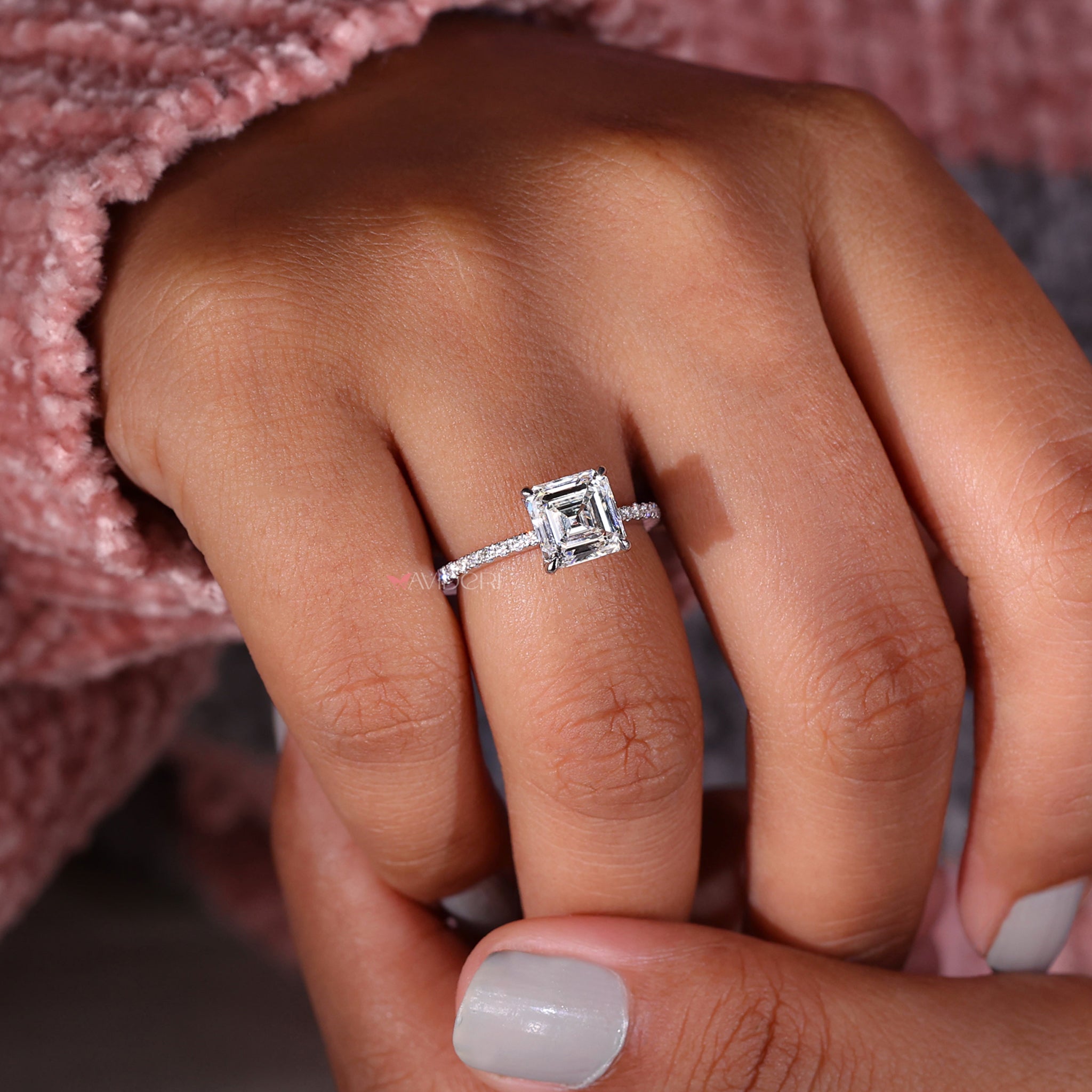 Asscher cut diamond engagement ring in a prong setting, showcasing exquisite craftsmanship and sustainable Lab Grown Diamonds.
