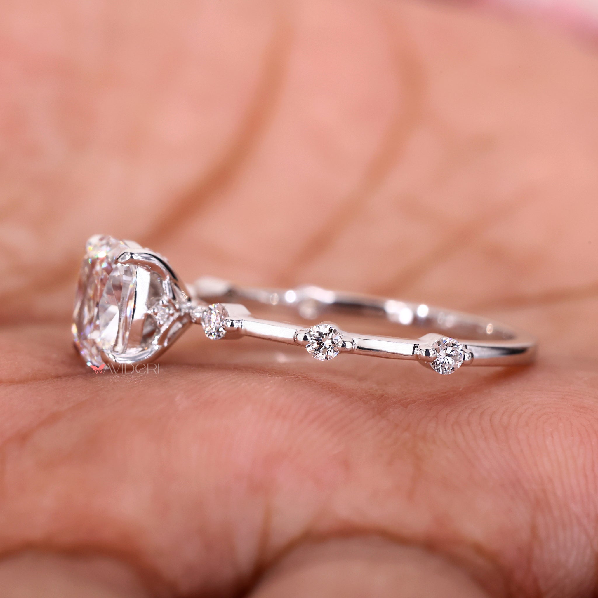 Avideri engagement ring designed with a cushion cut diamond and white gold for a luxurious and stylish finish.
