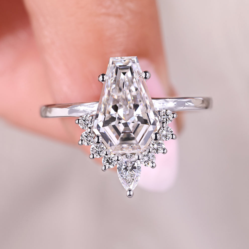 Coffin cut diamond ring in white gold setting.