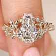 Coffin cut diamond ring with round diamond pave.
