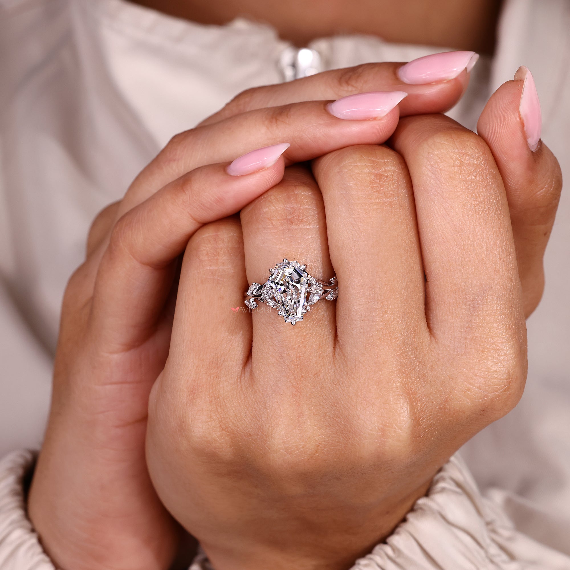 Coffin cut ring with nature inspired cluster design.

