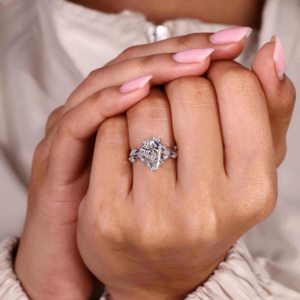 Coffin cut ring with nature inspired cluster design.
