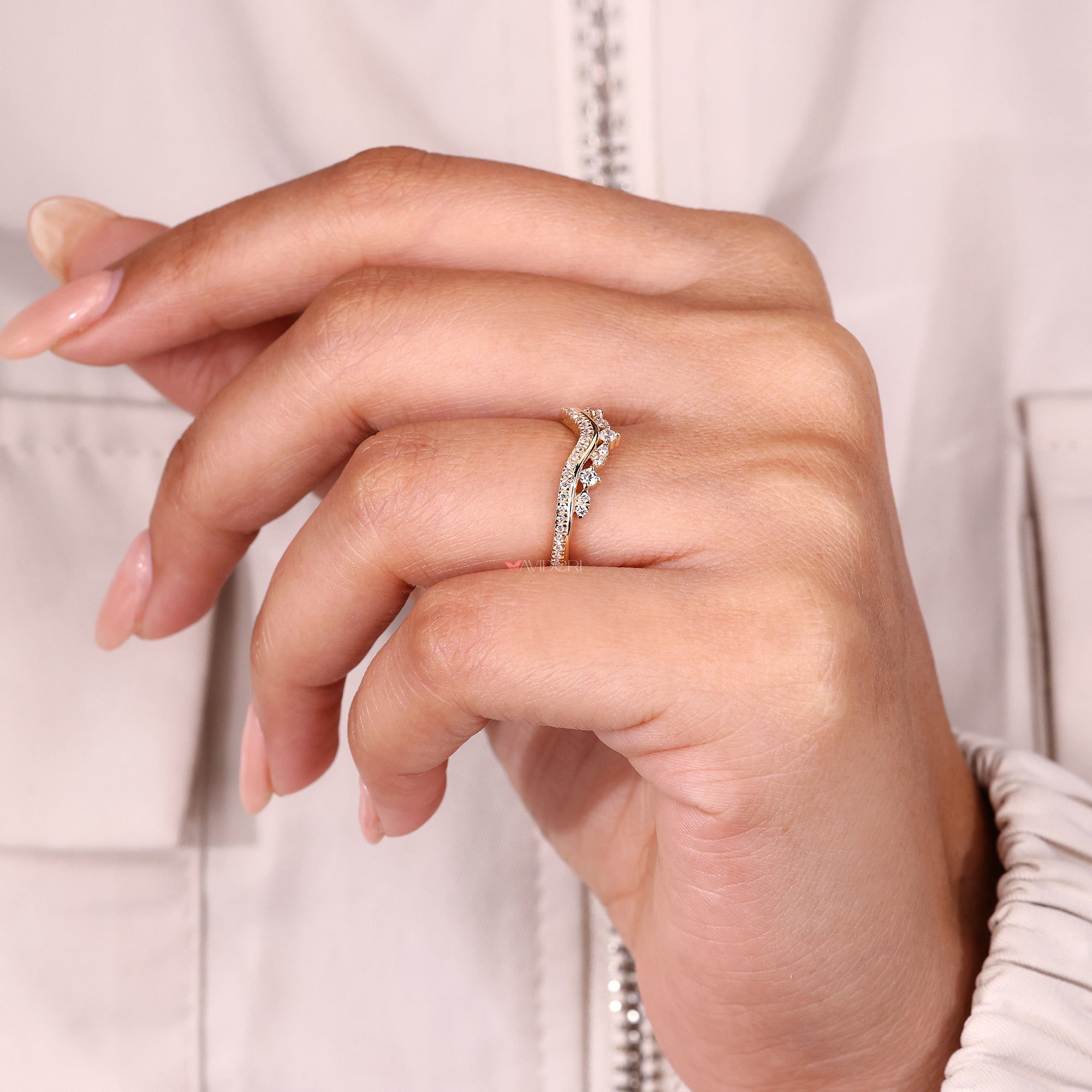Curved diamond band with double row pave.
