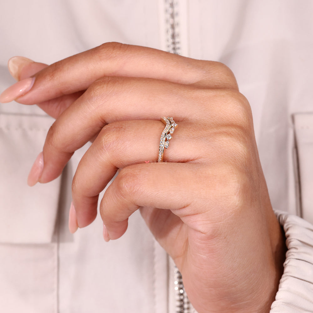 Curved diamond band with double row pave.
