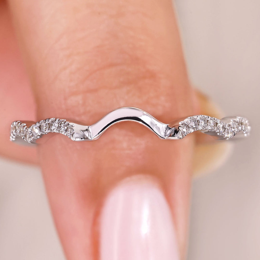 Avideri handmade curved diamond wedding band.