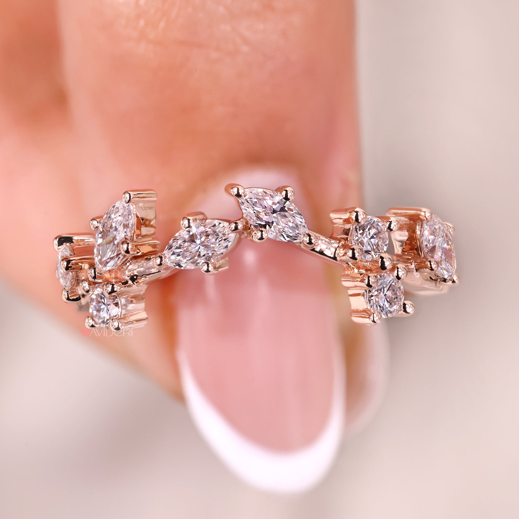 Curved Diamond Wedding Band in rose gold.