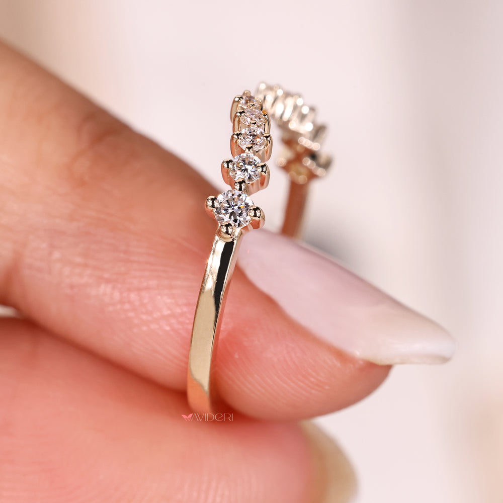 Half eternity band with shared prong setting.