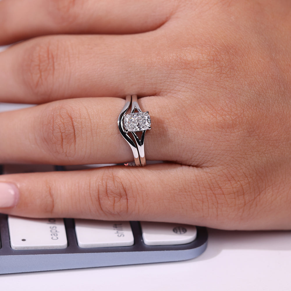 Handmade jewelry with a cushion cut ring and classic wedding band.