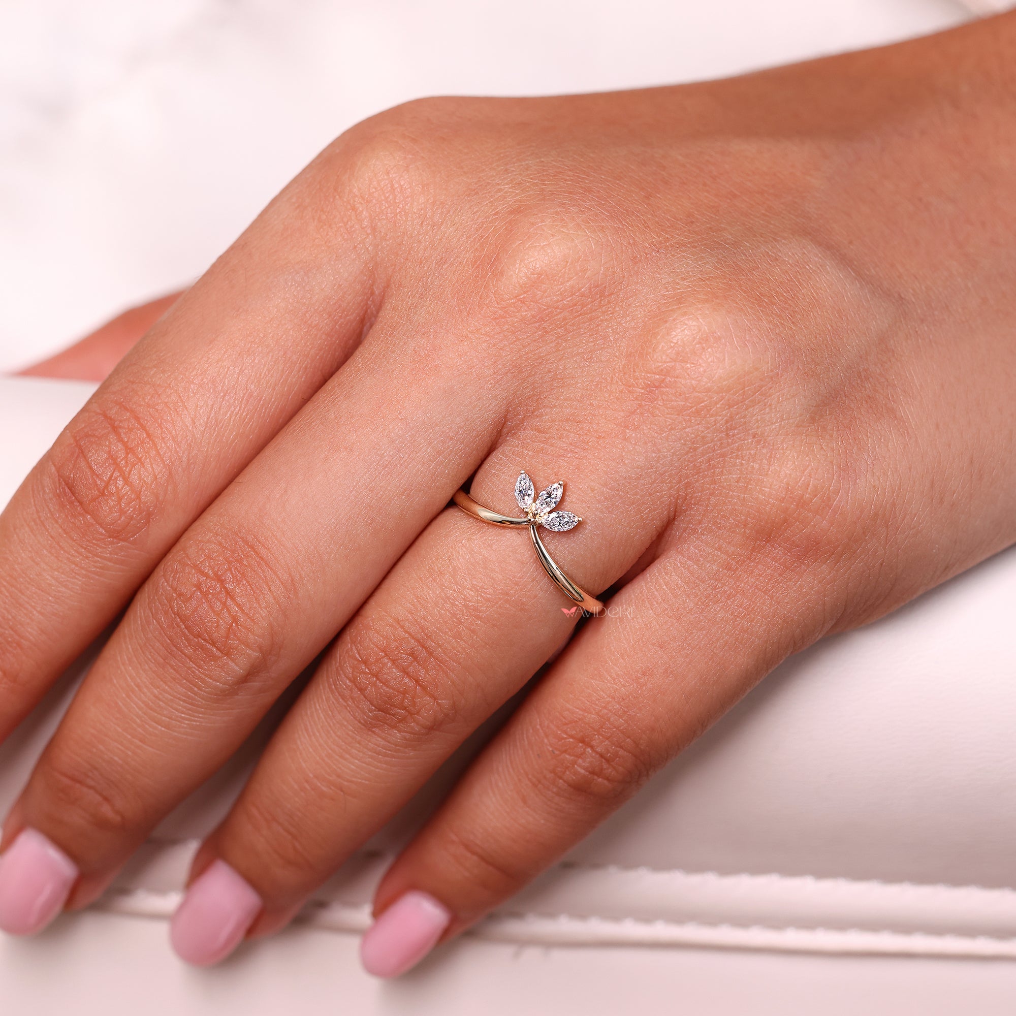 Three-stone wedding band with prong-set diamonds.