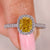 Cushion cut diamond ring with elegant cathedral setting.
