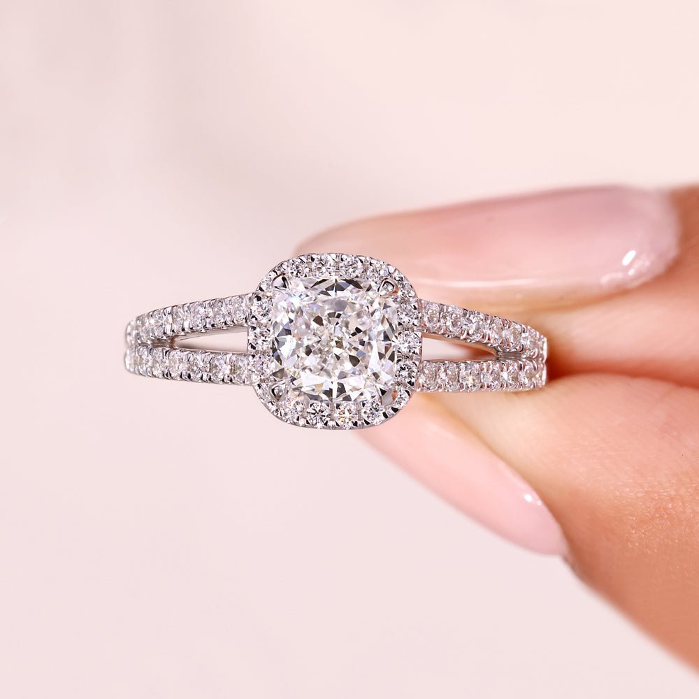 Handmade cushion cut diamond halo engagement ring.
