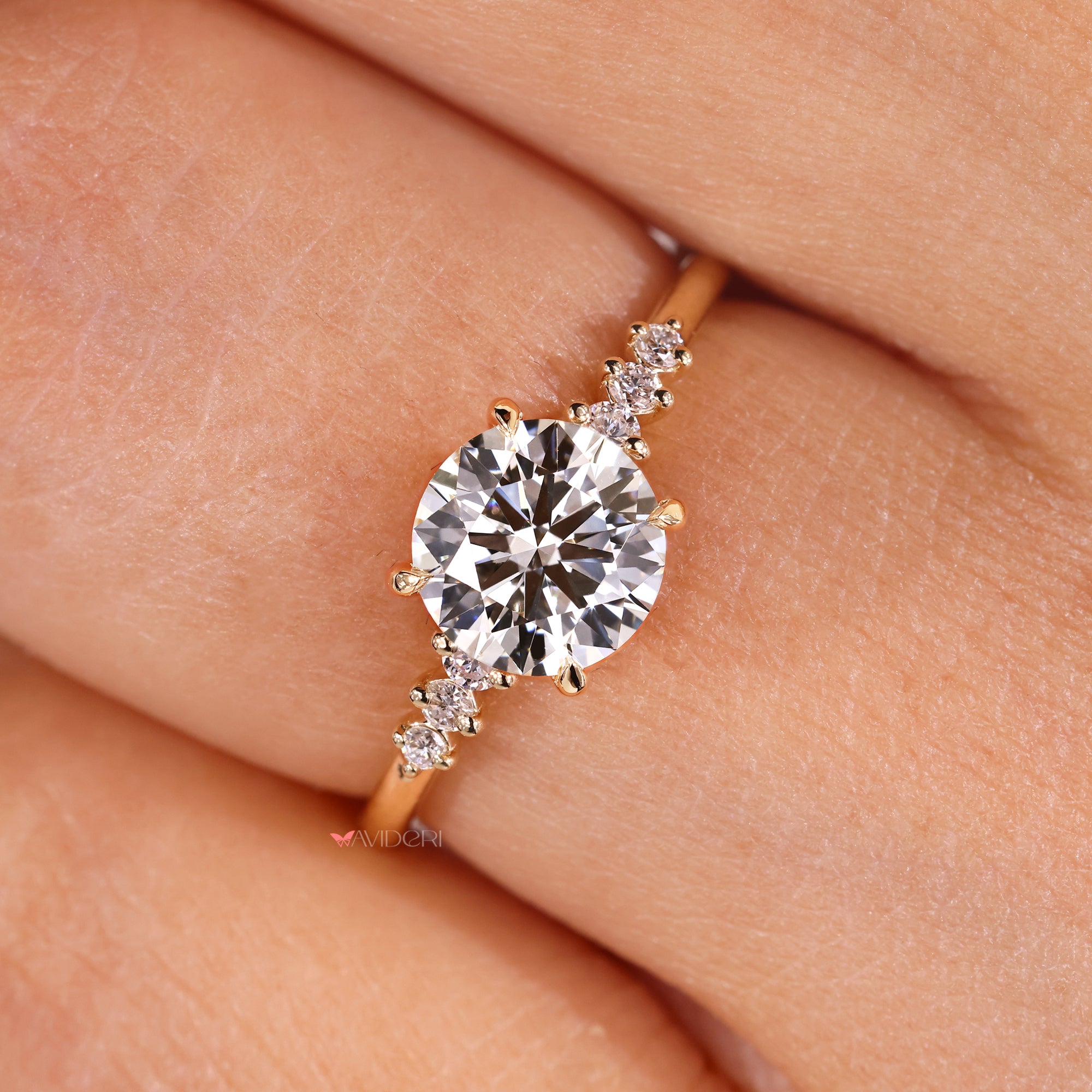 Round diamond engagement ring with 4 claw prong setting.