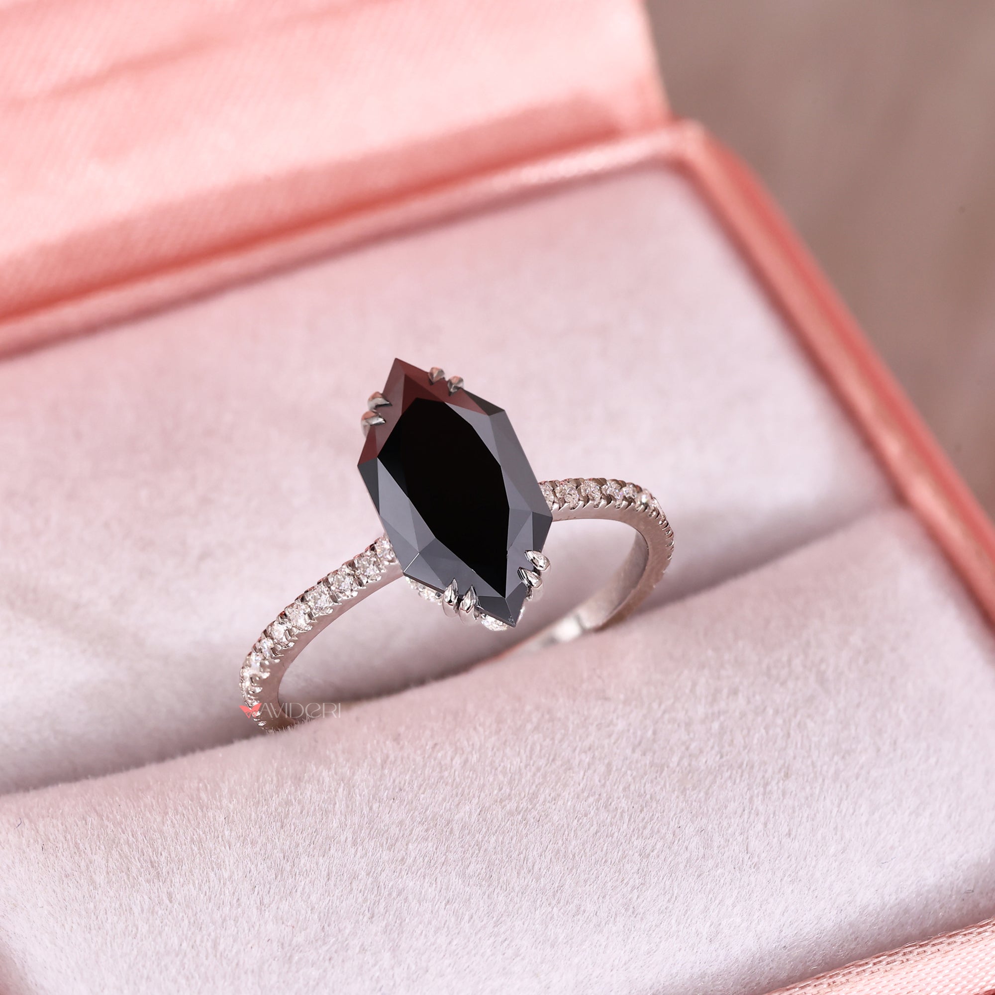Dutch Marquise Engagement Ring paired with hidden halo setting.
