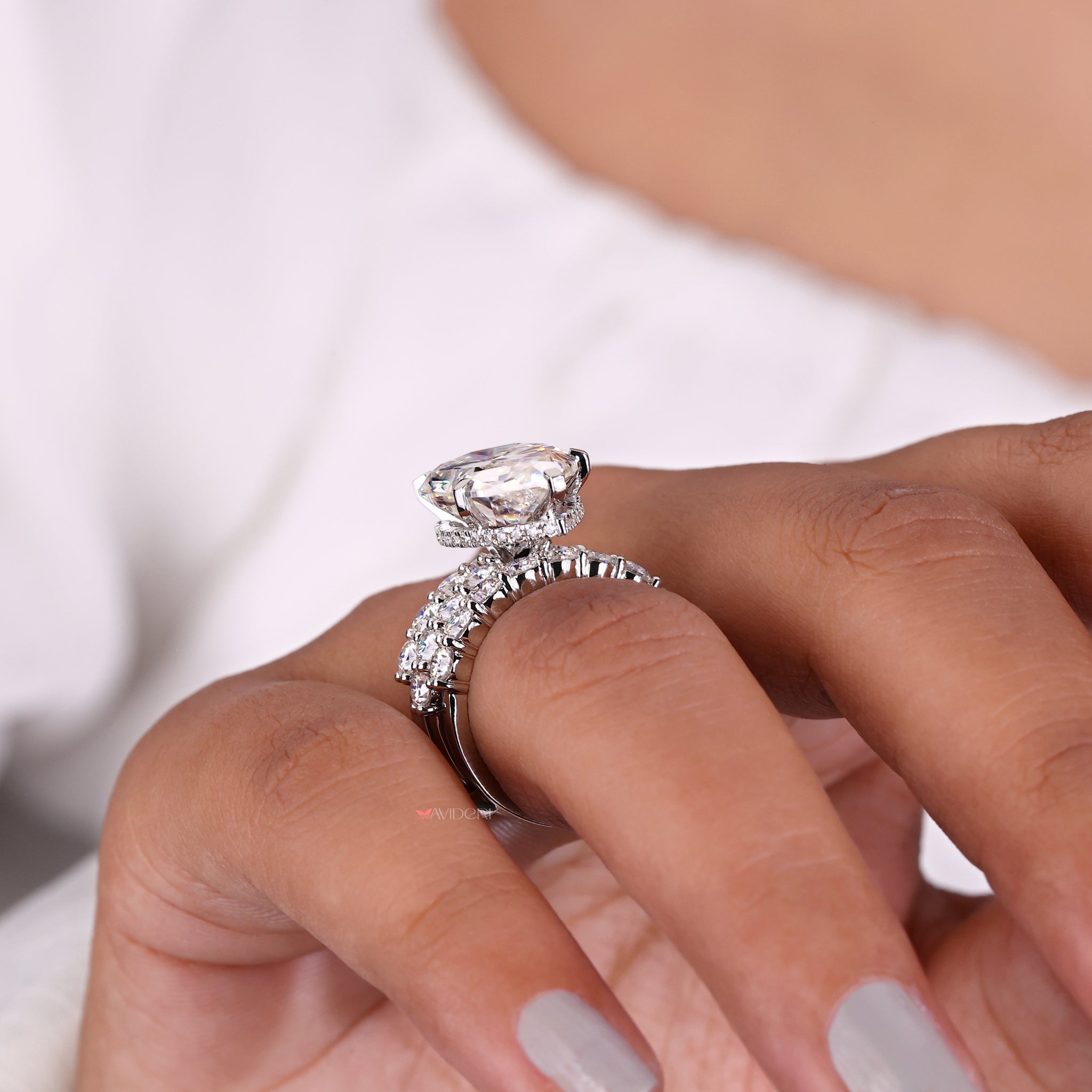 Handmade Jewelry highlighting intricate, custom designs for your special day.