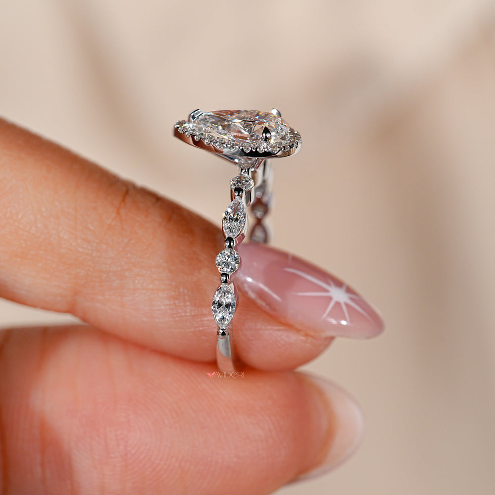 Shared prong engagement ring showcasing brilliant diamonds.

