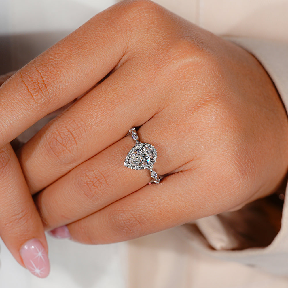 Marquise side diamonds adding sophistication to the design.
