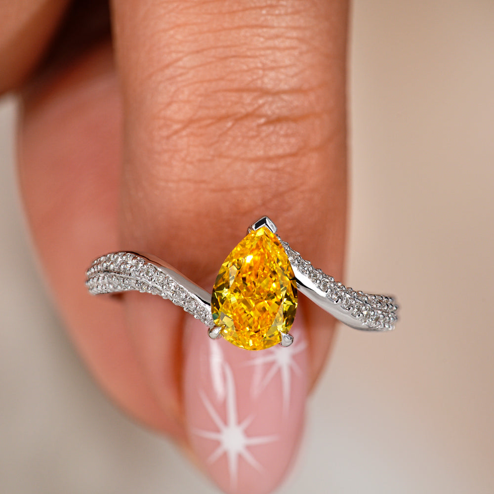 Secure v shaped prong setting ensuring flawless diamond brilliance.