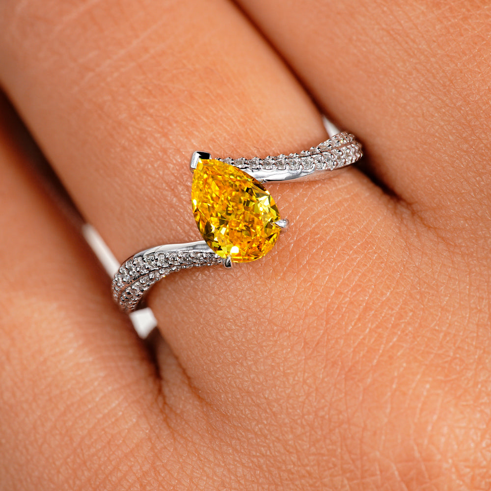 Stylish bypass setting ring with graceful curves and charm.
