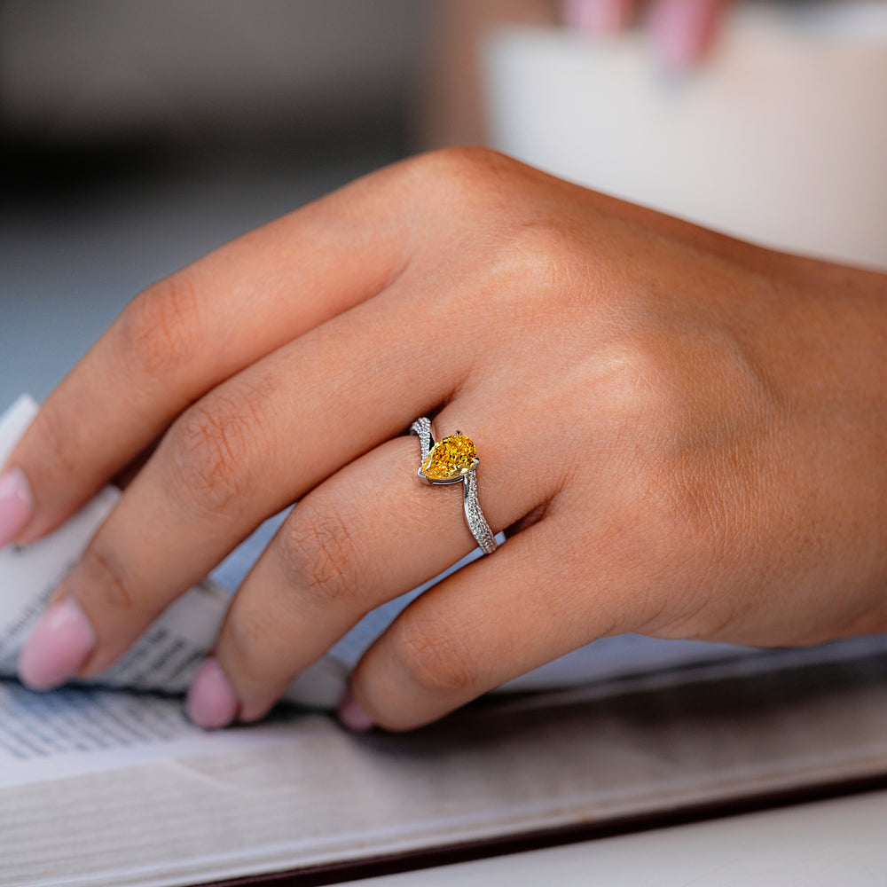 Beautiful pear shape diamond ring perfect for a romantic proposal.
