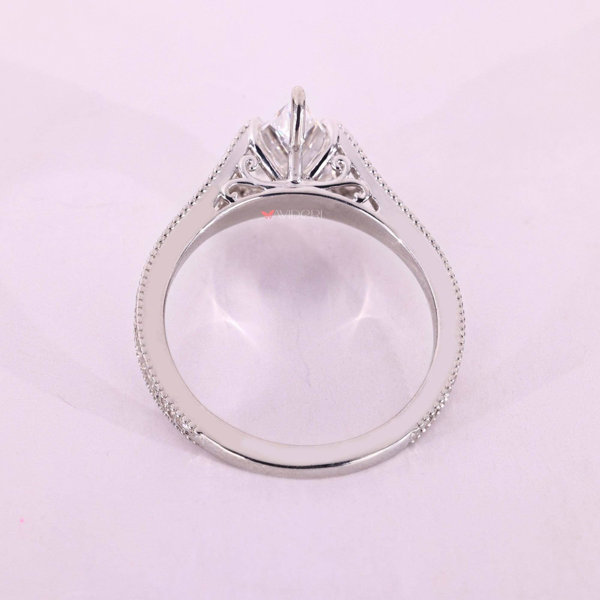 Handmade kite cut diamond engagement ring by Avideri.