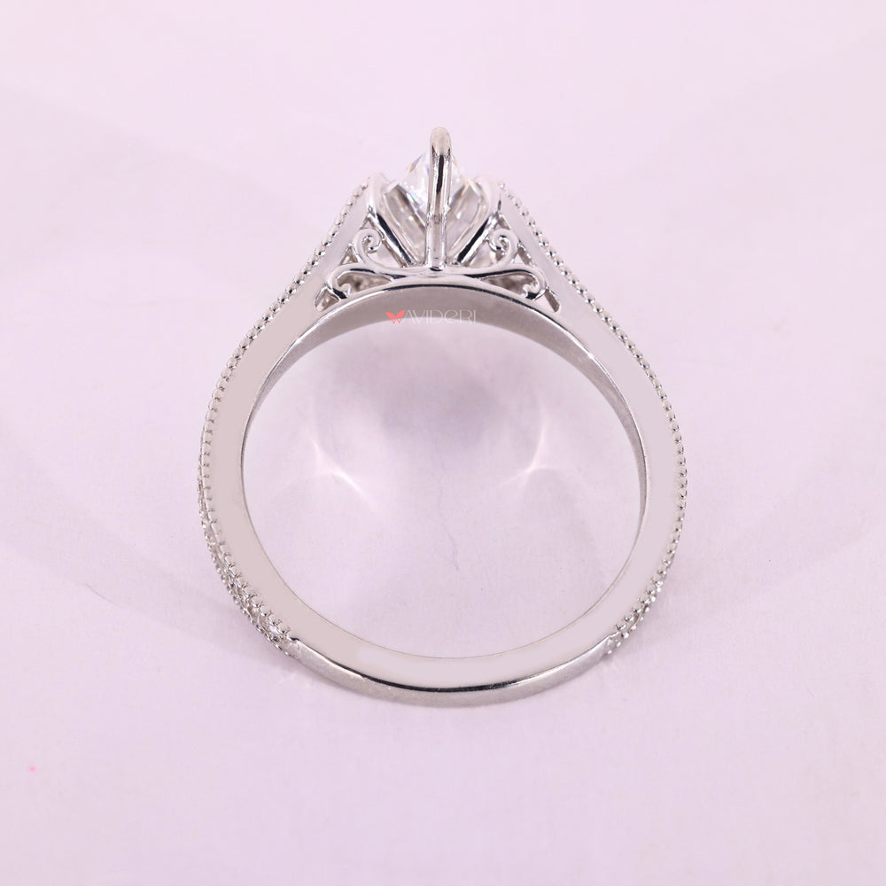 Handmade kite cut diamond engagement ring by Avideri.