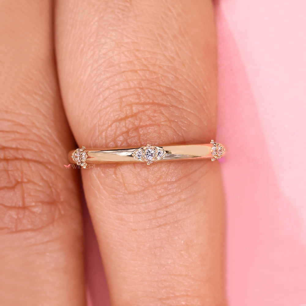 Handmade diamond band with prong setting.
