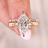 Hidden halo diamond engagement ring with band.