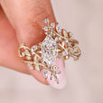 Nature inspired cluster diamond engagement ring set.
