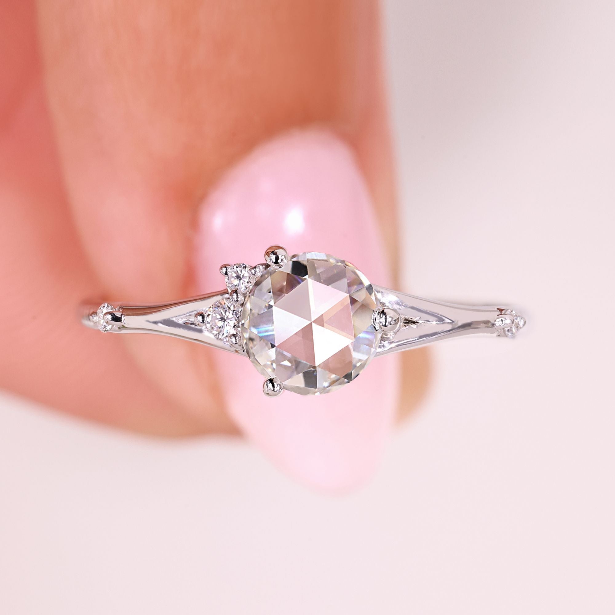 Five stone diamond ring with rose cut center.

