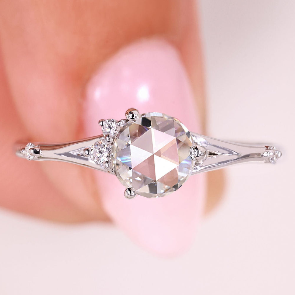 Five stone diamond ring with rose cut center.
