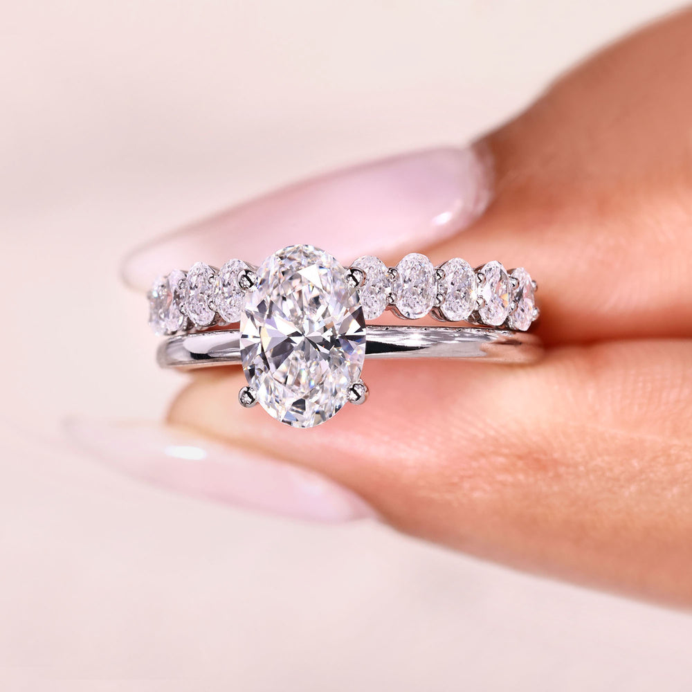 Lab grown oval diamond ring and wedding band.
