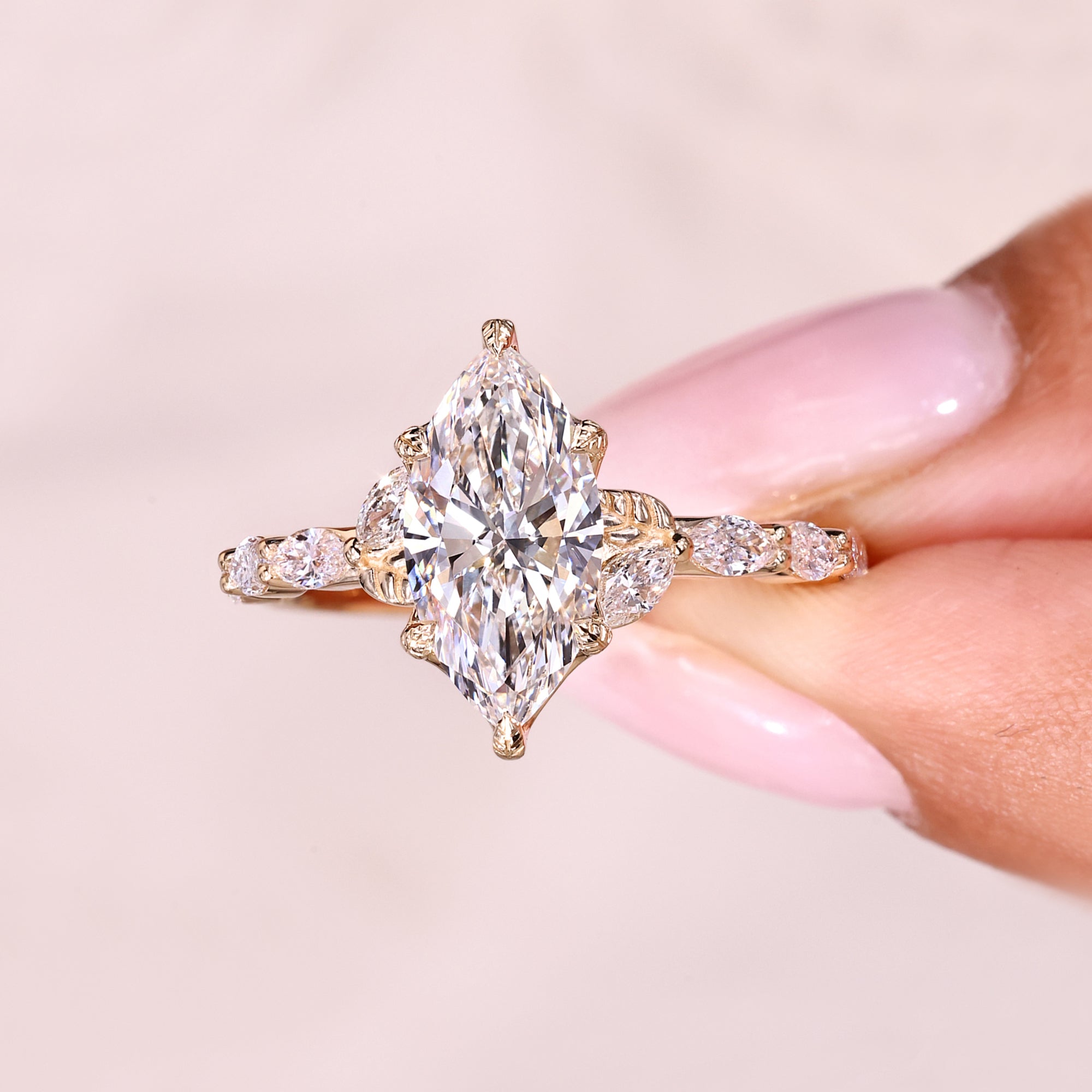 Marquise ring with pave diamond design style.
