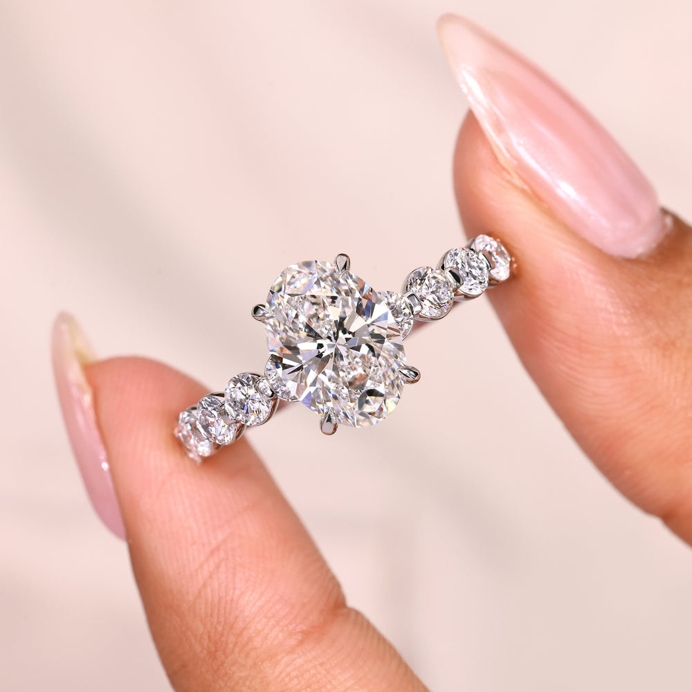 Four claw prong oval diamond ring handmade.
