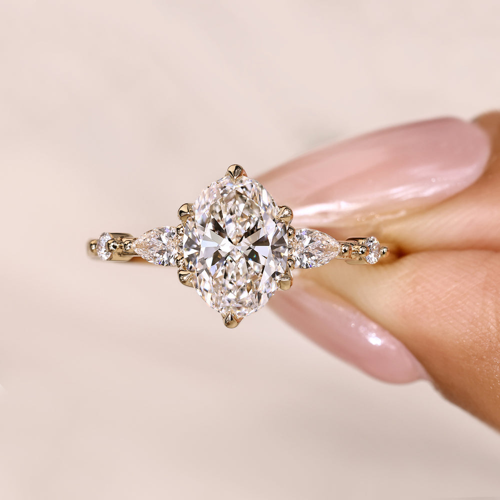Lab grown diamond oval ring five stone style.

