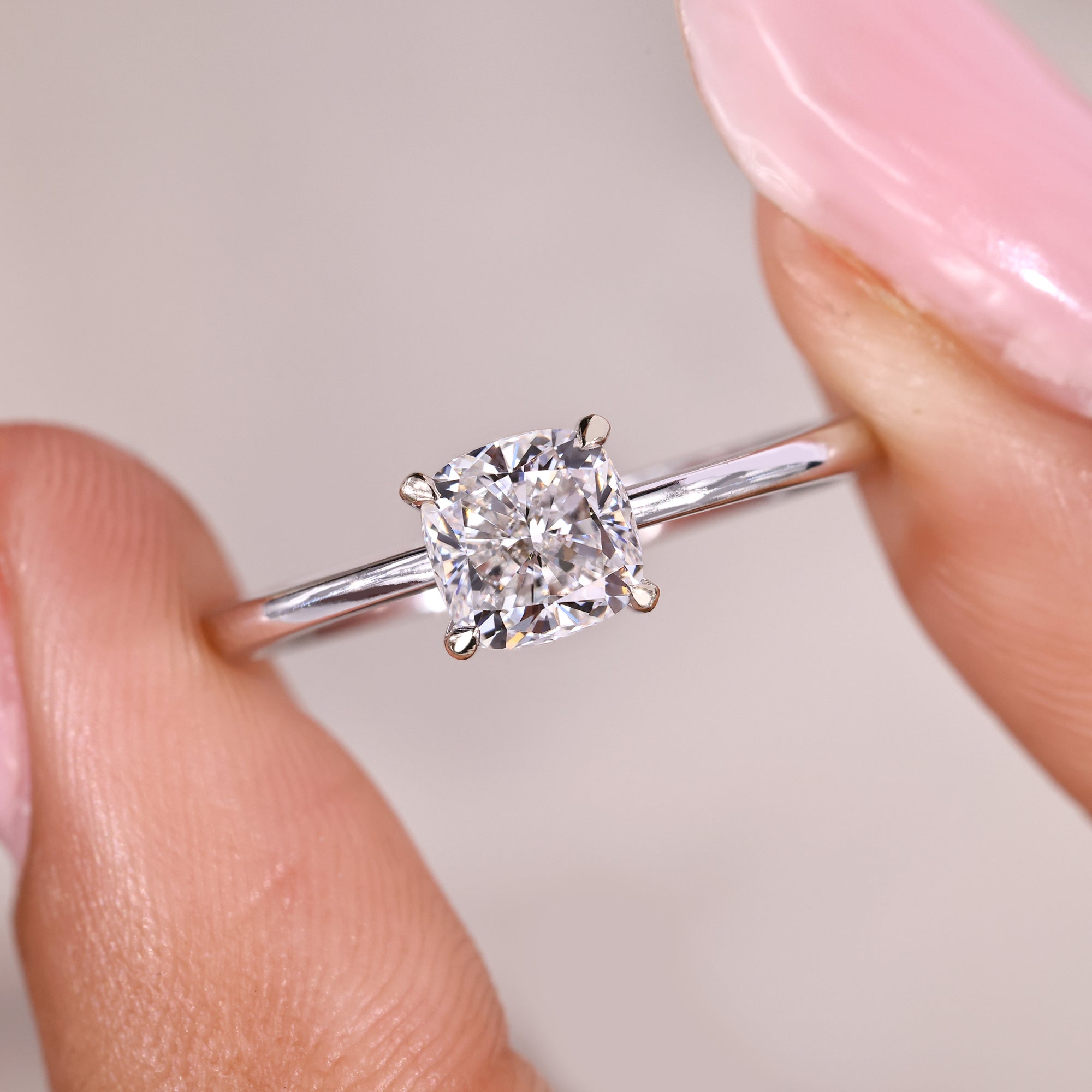 IGI certified lab grown cushion cut diamond solitaire ring.