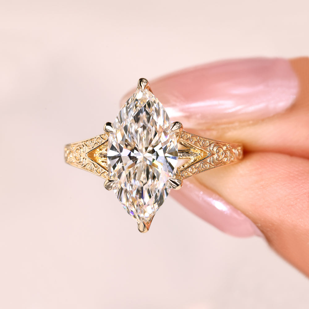 Marquise ring with tulip basket and prong set.
