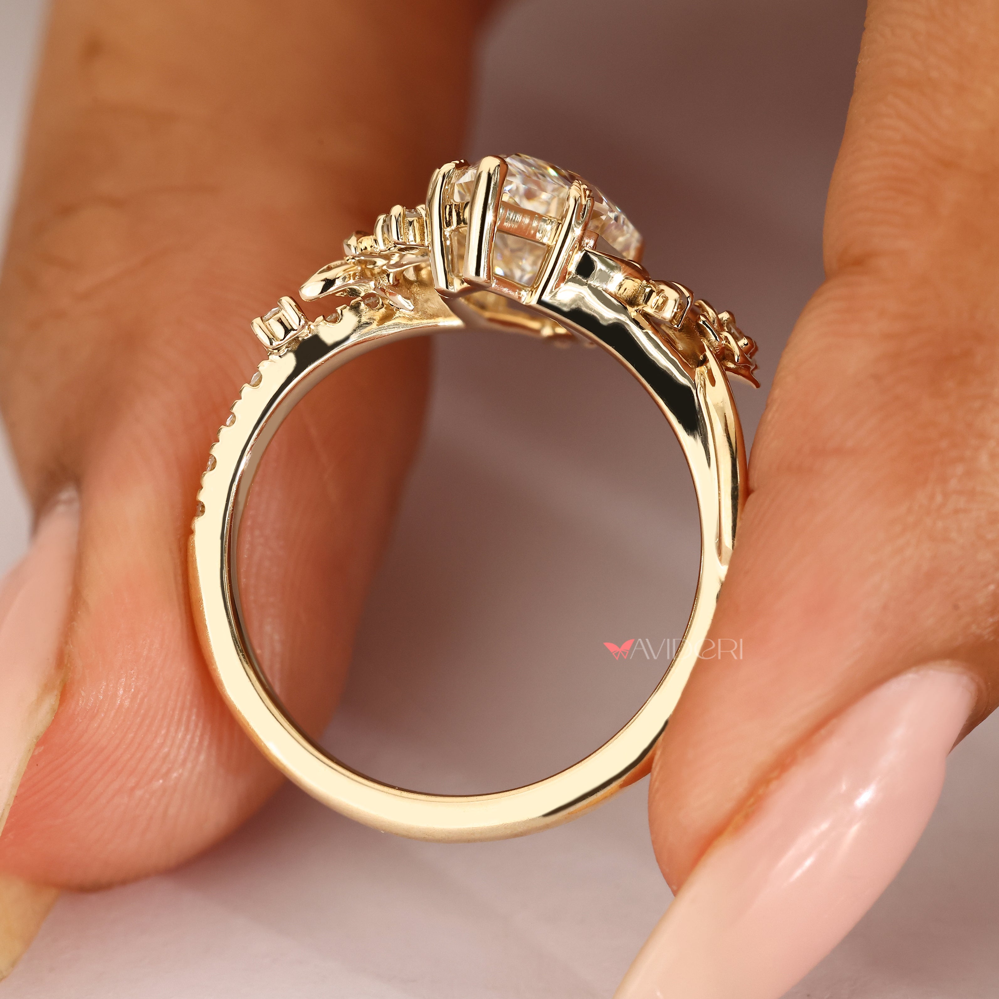 Nature inspired marquise diamond ring with flowers.
