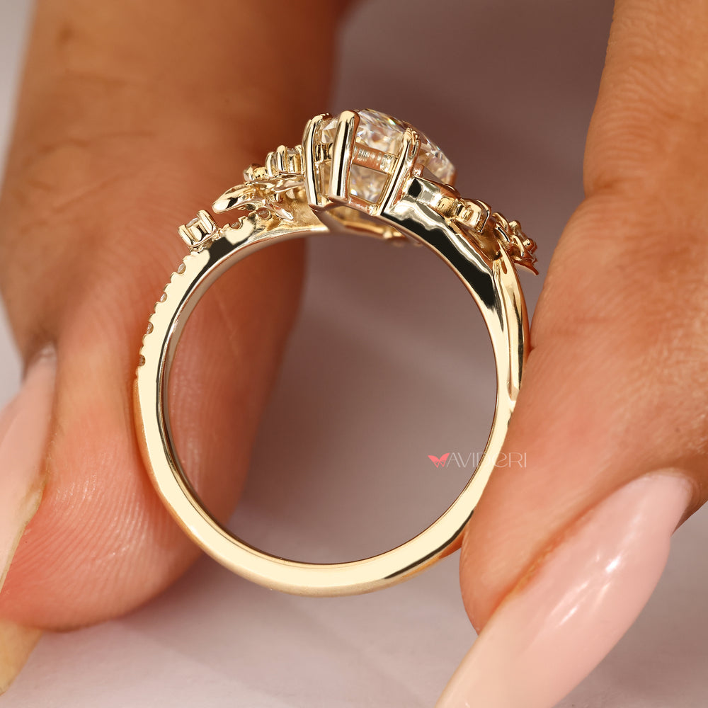 Nature inspired marquise diamond ring with flowers.
