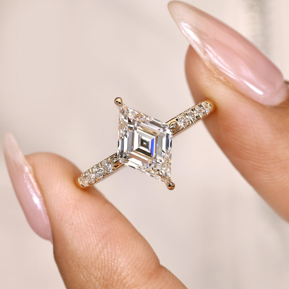 Lozenge cut ring with claw prong setting style.
