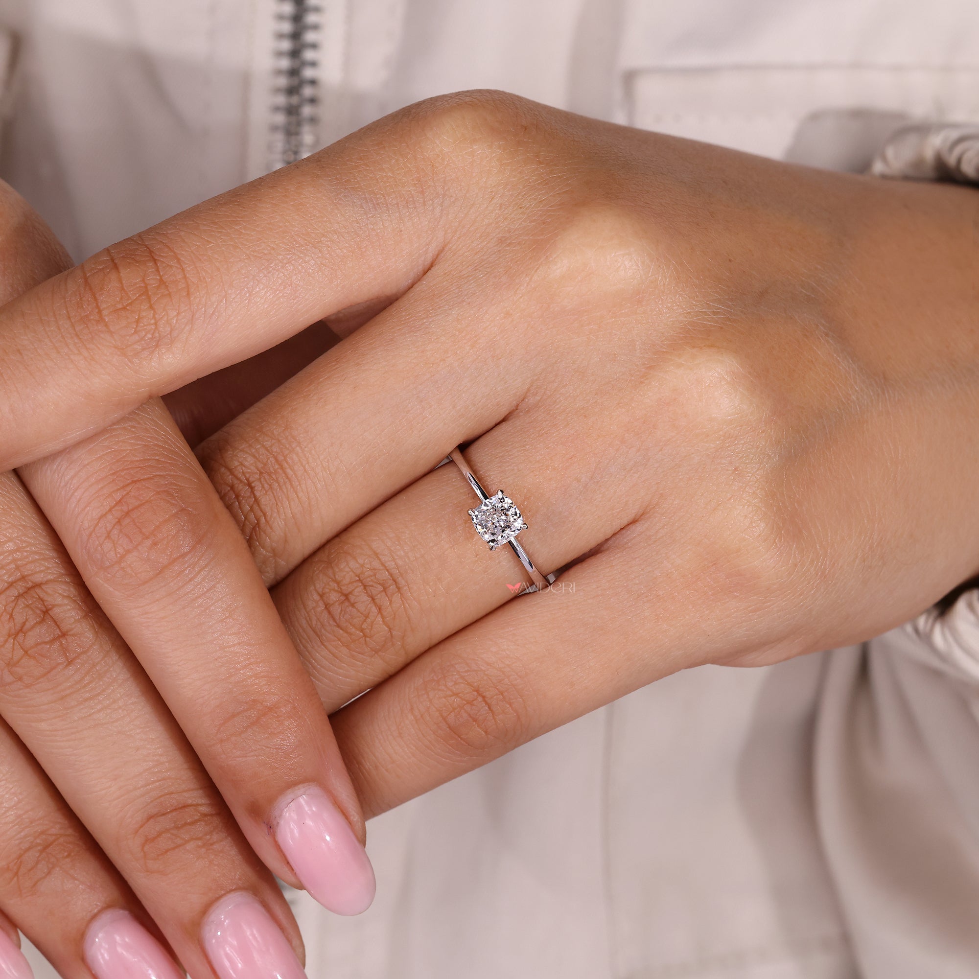 Cushion cut lab grown diamond ring with clean design.