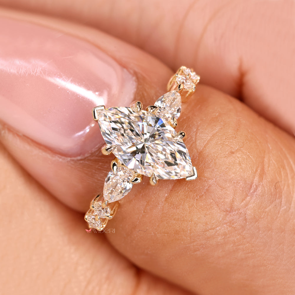 Marquise ring with v prong and claw prong set.
